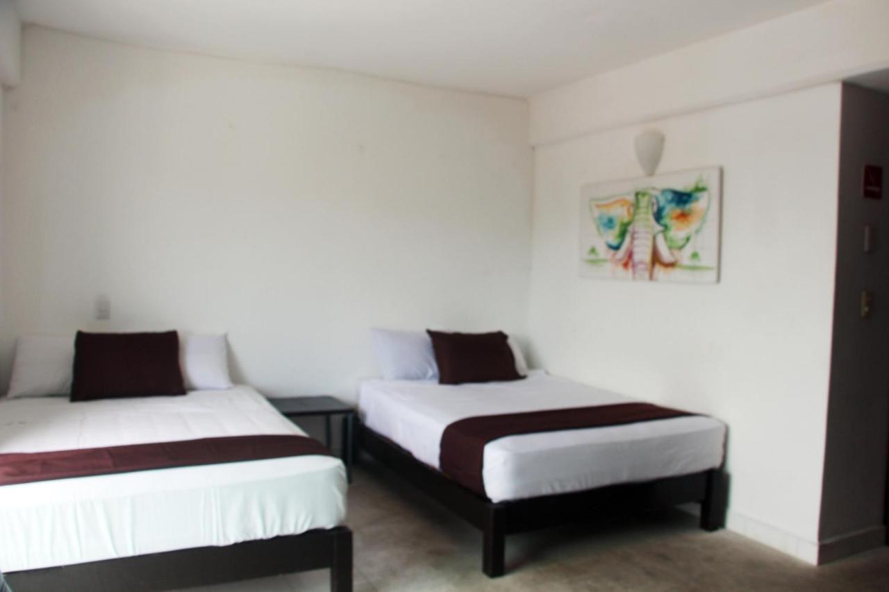 Hotel & Hostal Casa De Luz Канкун Экстерьер фото