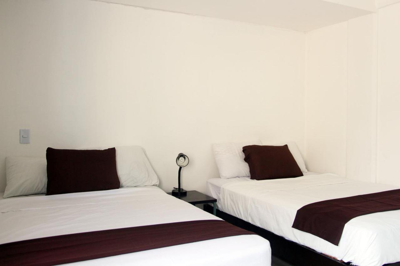 Hotel & Hostal Casa De Luz Канкун Экстерьер фото